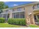 Two-story townhome with screened porch and balcony at 184 Valencia Cir, St Petersburg, FL 33716