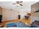 Living room with hardwood floors and view of kitchen and dining area at 184 Valencia Cir, St Petersburg, FL 33716