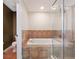 Bathroom with tub, shower, and view into another room at 184 Valencia Cir, St Petersburg, FL 33716