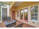 Outdoor space with screened porch, fire pit, and wooden deck at 184 Valencia Cir, St Petersburg, FL 33716