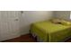 Bright bedroom with double bed and wood floors at 12510 Sparkleberry Rd, Tampa, FL 33626