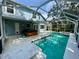 Relaxing screened pool and spa area at 4031 Quail Briar Dr, Valrico, FL 33596
