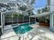 Inviting screened pool with a spacious deck at 4031 Quail Briar Dr, Valrico, FL 33596