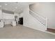 Modern kitchen with white cabinets, island and stainless steel appliances at 31421 Anniston Dr, Wesley Chapel, FL 33543