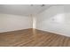Large bonus room with wood-look floors and ample storage at 31421 Anniston Dr, Wesley Chapel, FL 33543