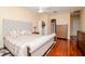 Main bedroom with hardwood floors, ample closet space, and a luxurious feel at 17812 Arbor Greene Dr, Tampa, FL 33647