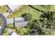 Overhead view of single Gathering home with yard at 37700 Neukom Ave, Zephyrhills, FL 33541