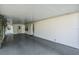 Covered carport with access to both the front and rear of the home at 37700 Neukom Ave, Zephyrhills, FL 33541
