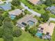 Spacious home with a screened lanai and a private pool, surrounded by lush landscaping at 13216 Legends Trl, Dade City, FL 33525