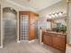 Spacious bathroom with granite counters on the vanity and walk-in shower at 13216 Legends Trl, Dade City, FL 33525