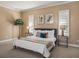 Bright main bedroom features neutral walls, carpet flooring and large windows with plantation shutters at 13216 Legends Trl, Dade City, FL 33525