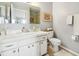 Bathroom features a vanity and shower at 329 Grayston Pl # 112, Sun City Center, FL 33573