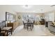 Charming dining area with wooden table and chairs at 329 Grayston Pl # 112, Sun City Center, FL 33573