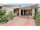 Attractive front entry with a covered porch and landscaped walkway at 329 Grayston Pl # 112, Sun City Center, FL 33573