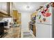 Efficient kitchen with ample cabinetry and counter space at 329 Grayston Pl # 112, Sun City Center, FL 33573