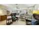 Cozy living room featuring leather armchairs and a neutral color scheme at 329 Grayston Pl # 112, Sun City Center, FL 33573