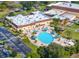 Relaxing pool area with lounge chairs and umbrellas at 329 Grayston Pl # 112, Sun City Center, FL 33573