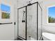 Modern bathroom with marble shower and freestanding tub at 3310 W Arch St, Tampa, FL 33607