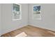 Spacious bedroom with light walls and wood-look flooring at 3310 W Arch St, Tampa, FL 33607