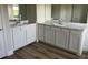 Elegant bathroom with dual sinks, marble countertop, and ample storage space at 908 160Th E Ln, Bradenton, FL 34212