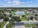 Aerial view of house near a pond at 17350 Garden Heath Ct, Land O Lakes, FL 34638
