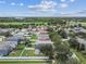 Aerial view of the house and surrounding area at 17350 Garden Heath Ct, Land O Lakes, FL 34638