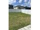 Fenced-in grassy backyard at 17350 Garden Heath Ct, Land O Lakes, FL 34638