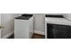 Laundry room with front load washer and dryer at 17350 Garden Heath Ct, Land O Lakes, FL 34638