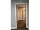 Hallway showcasing neutral paint and laminate floors at 1920 N Highland Ave, Clearwater, FL 33755