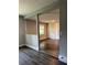 Inviting living room showcasing laminate floors, neutral walls and a window offering natural light at 1920 N Highland Ave, Clearwater, FL 33755