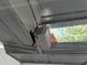 Close-up of damaged soffit, indicating areas needing repair, and/or pest infestation at 1920 N Highland Ave, Clearwater, FL 33755
