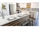 Modern kitchen island with white quartz countertop and wooden base at 1920 N Highland Ave, Clearwater, FL 33755