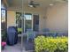 Relaxing screened patio with brick floors and outdoor seating is perfect for enjoying the Florida weather at 15953 Cobble Mill Dr, Wimauma, FL 33598