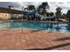 Resort-style pool with plenty of lounge chairs at 15953 Cobble Mill Dr, Wimauma, FL 33598
