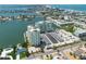 Wide aerial view of waterfront property, showing surrounding area at 400 64Th Ave # 704, St Pete Beach, FL 33706