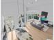 Bright open living room featuring modern decor, large windows, and kitchen at 780 Eldorado Ave, Clearwater, FL 33767