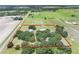 Aerial view of property showcasing house and expansive land at 8602 State Road 674, Wimauma, FL 33598