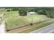 Aerial view of property showing home and large lot at 8602 State Road 674, Wimauma, FL 33598