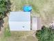 Overhead view of a metal roof house with a pool and shed at 8602 State Road 674, Wimauma, FL 33598