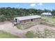 Aerial view of barn and surrounding area at 8602 State Road 674, Wimauma, FL 33598