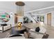 Modern living room with comfortable seating and large mirror at 780 Eldorado Ave, Clearwater, FL 33767