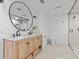 Spa-like bathroom with double vanity, large mirror, and walk-in shower at 780 Eldorado Ave, Clearwater, FL 33767