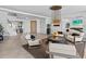 Bright living room with contemporary furniture and a chandelier at 780 Eldorado Ave, Clearwater, FL 33767