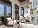 Covered patio offers comfortable seating and ocean views at 780 Eldorado Ave, Clearwater, FL 33767