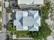 Bird's-eye view of a home with metal roof and pool at 780 Eldorado Ave, Clearwater, FL 33767