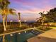 Inviting heated pool with lounge chairs and ocean views at 780 Eldorado Ave, Clearwater, FL 33767