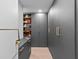 Large walk-in closet with ample shelving and drawers at 780 Eldorado Ave, Clearwater, FL 33767