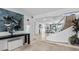Open concept living area with modern furniture and ocean view at 780 Eldorado Ave, Clearwater, FL 33767