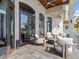 Relaxing outdoor patio with comfortable seating and ocean views at 780 Eldorado Ave, Clearwater, FL 33767