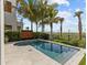 Inviting rectangular pool with a curved edge and ocean views at 780 Eldorado Ave, Clearwater, FL 33767